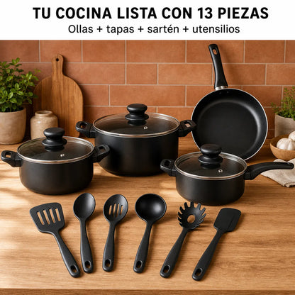 Set de ollas antiadherente premium de 13 piezas: ollas, tapas de vidrio, sartén y utensilios sobre encimera de madera